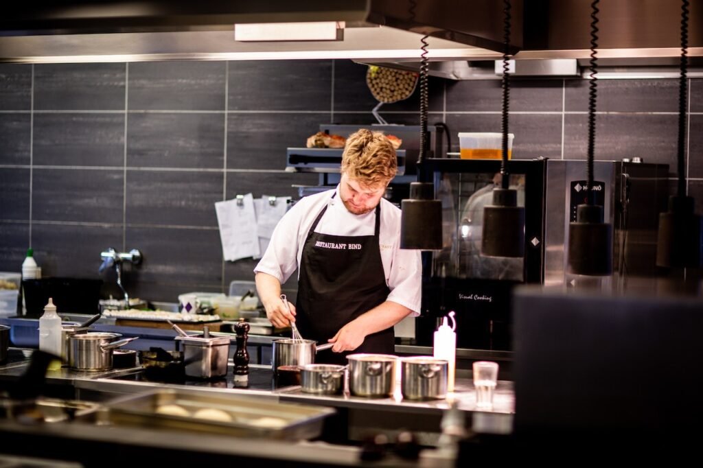 What are the pros and cons of renting commercial kitchen space for a UK foodtech company